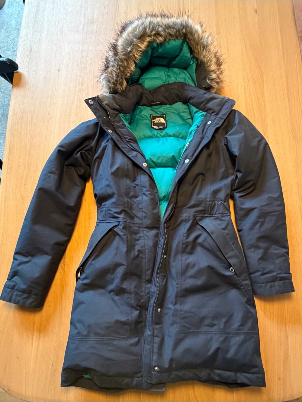 The North Face Women's navy blue Parka with Teal Interior and Faux Fur Hood